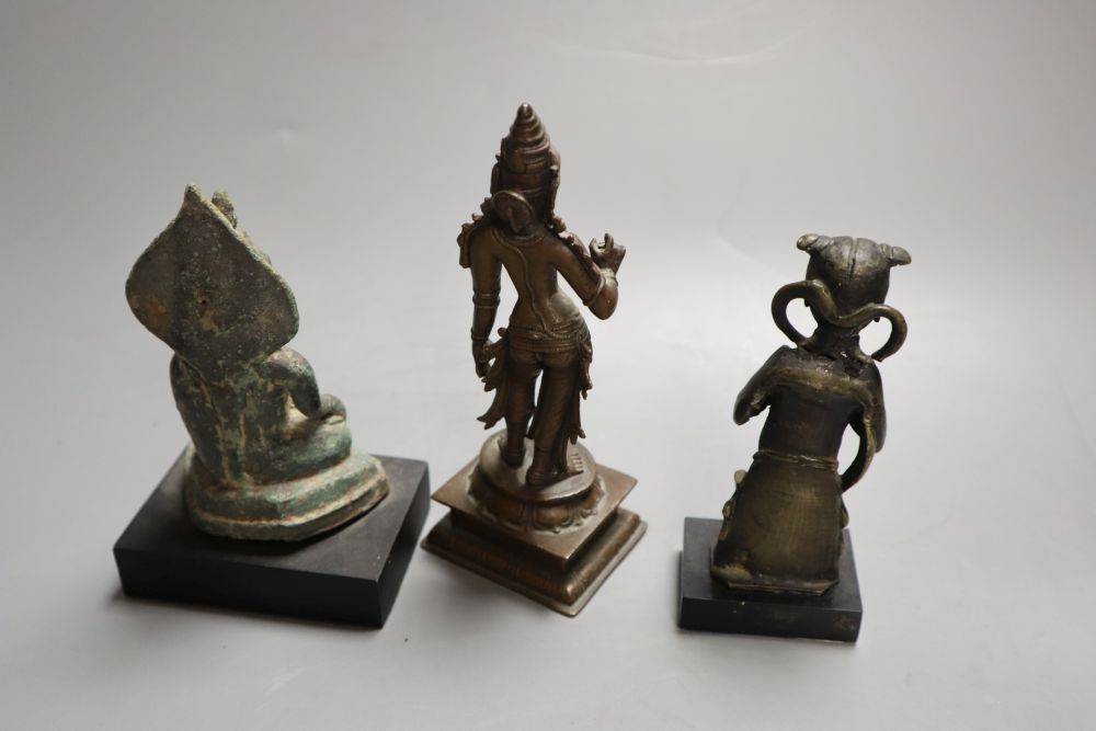 An Asian bronze Buddha, Ming bronze figure fragment and an Indian bronze figure, a hardstone cup, soapstone seals etc, tallest 15.5cm